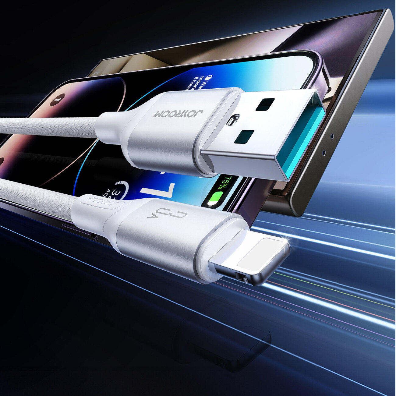 Na obrazie widoczny jest kabel USB-A do Lightning z oznaczeniem \'3A\' oraz logo \'JOYROOM\'. W tle znajduje się smartfon z wyświetlaczem.