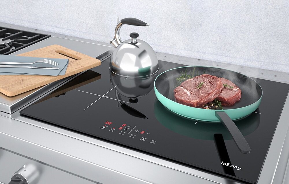 Płyta indukcyjna ISEASY LI3-17 Płyta indukcyjna prezentuje trzy naczynia z kolorowymi potrawami ustawione na jej strefach grzewczych. Układ pokazuje, że płyta pomieści różne rodzaje garnków jednocześnie moc 1200W 1600W 2000W Booster