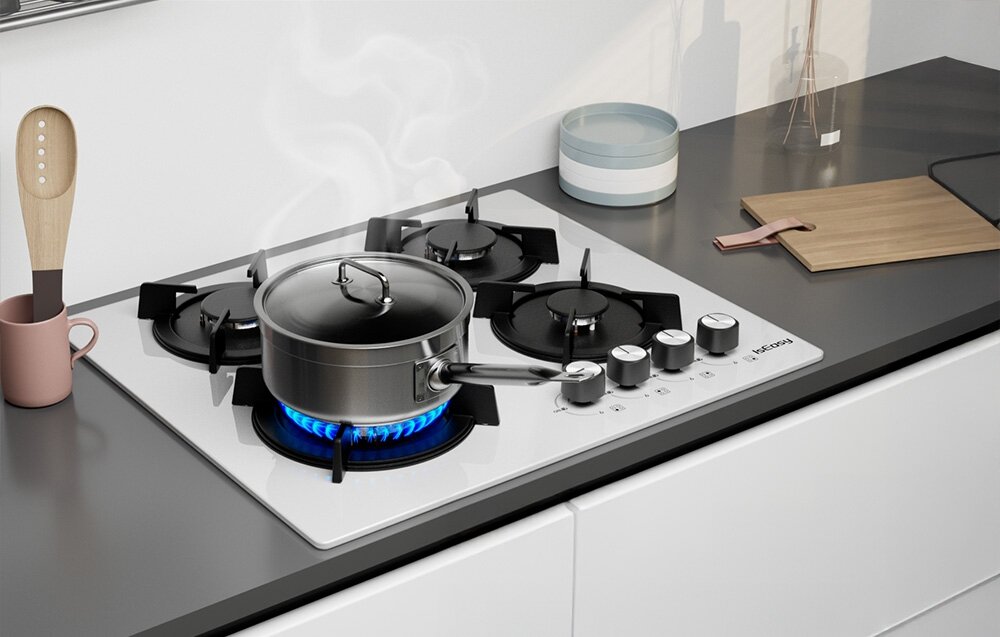 PŁYTA GAZOWA ISEASY MGBG-604B Garnek na środkowym palniku gotuje się na mocnym płomieniu, a wokół znajdują się dodatkowe wolne palniki. Kompozycja podkreśla funkcjonalność układu czterech miejsc grzewczych zabezpieczenie przeciwwypływowe czujnik płomienia odcięcie gazu bezpieczne gotowanie