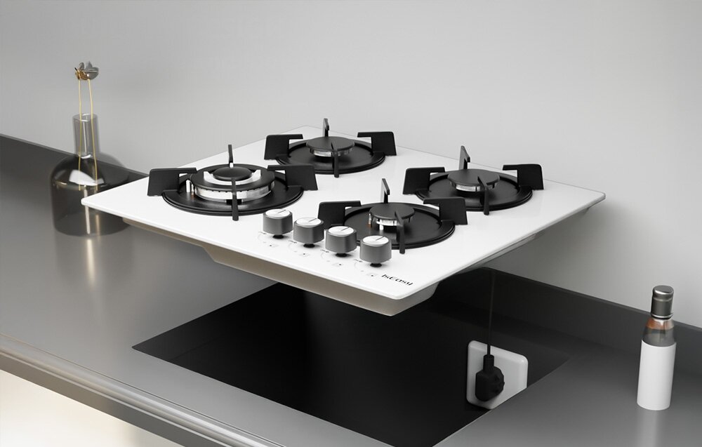 PŁYTA GAZOWA ISEASY MGBG-604B Płyta gazowa została uniesiona nad wycięciem w blacie, co ukazuje jej dolną konstrukcję i system montażowy. Cztery palniki oraz rząd pokręteł tworzą przejrzysty układ wymiary 60x51x11,5 cm montaż 56x48 cm płyta do zabudowy standardowy blat