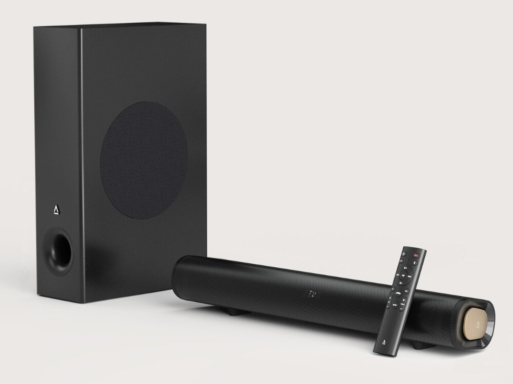 Głośniki CREATIVE Stage Pro 2.1
                soundbar subwoofer i pilot na jasnym tle minimalistyczna forma matowa czerń kompaktowe wymiary monitor telewizor pilot sterowanie głośnością źródłem dźwięku ustawieniami audio