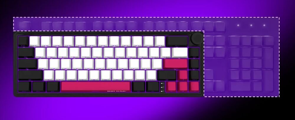 Klawiatura z białymi klawiszami, czarnymi i czerwonymi akcentami, na fioletowym tle. Widoczny jest napis \'MADE IN SPACE\' na dolnym klawiszu.