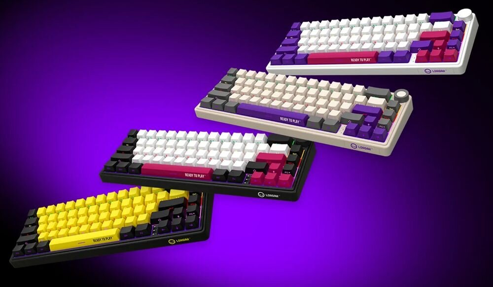 Na obrazie widoczne są cztery klawiatury w różnych kolorach: żółto-czarna, biało-fioletowa, biało-różowa i biało-beżowa. Na każdej klawiaturze znajduje się napis \'READY TO PLAY\' oraz logo \'Lorgar\'.