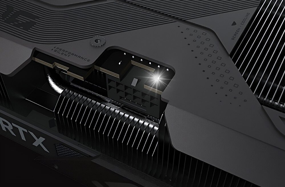 Karta graficzna GIGABYTE GeForce RTX 5070 Gaming OC 12GB Fragment obudowy z futurystycznym oznaczeniem Code / Cyborg, podkreślającym stylistykę karty