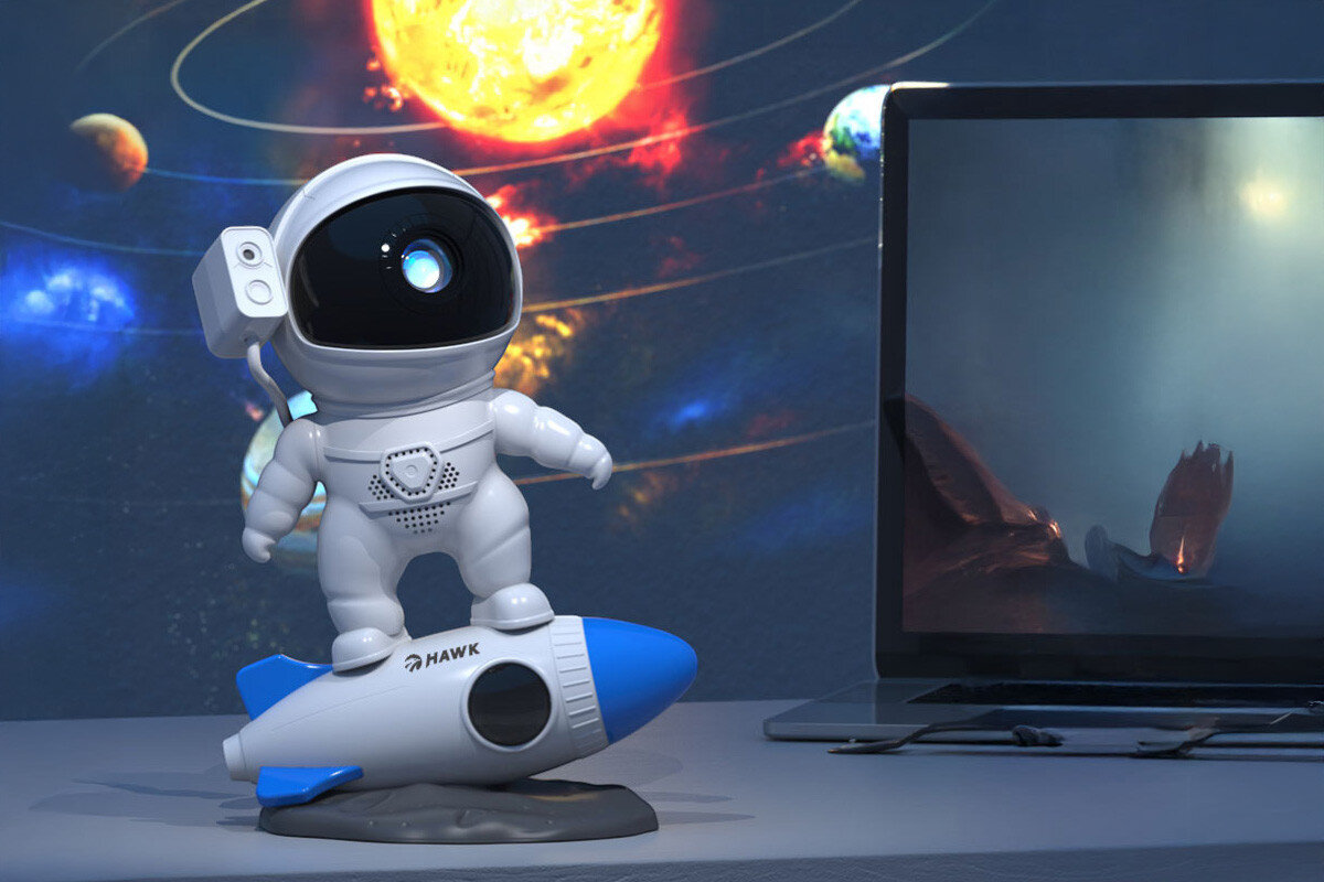 Projektor gwiazd z głośnikiem HAWK HW-STAR03 Astronauta Rakieta, figurka, dekoracja, rakieta, astronauta, Projektor astronauta na biurku przy laptopie