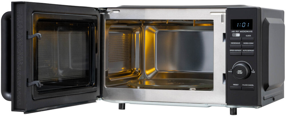 Kuchenka mikrofalowa GÖTZE & JENSEN MO920KAF Twin AirFry 1200W średnica 34.5 cm pojemność 20L Auto Defrost Quick Start Czarny otwarta kuchenka na białym tle widoczna od przodu funkcje Auto Defrost Speed Defrost możesz rozmrażać produkty na podstawie ich wagi lub wybranego czasu dopasować proces do rodzaju żywności składniki są gotowe do dalszej obróbki szybciej