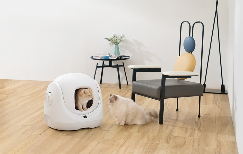Inteligentna kuweta dla kota CATLINK Baymax kot siedzi w kuwecie drugi kot siedzi obok automatycznie dba o czystość Trzy tryby pracy czujniki bezpieczeństwa Połączenie z aplikacją mobilną Pojemność 7 litrów kompatybilność z różnymi rodzajami żwirku partner w codziennej opiece nad kotem