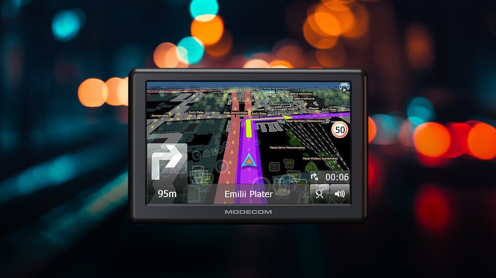 Nawigacja samochodowa, rowerowa i dla pieszych MODECOM FreeWAY CX 5.0  na tle nocnego miasta 