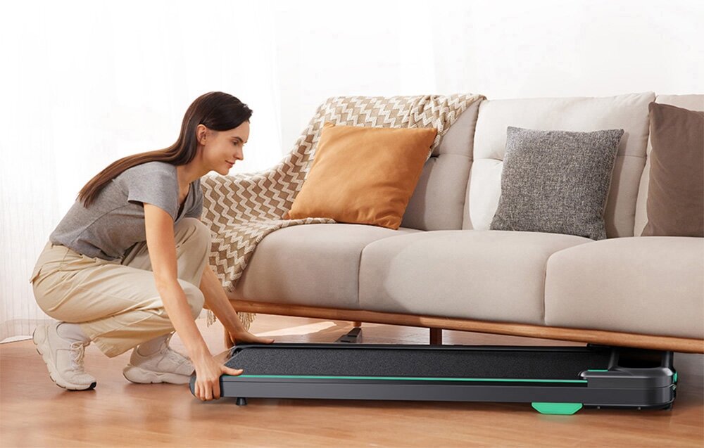 Bieżnia elektryczna UREVO Spacewalk E4 550W 6 km-h pokój osoba chowa bieżnię pod kanapą bieżnia o wymiarach 48 x 11.3 x 121 cm wygodna w przechowywaniu można bez problemu wsunąć ją pod łóżko lub kanapę nie zajmuje dużo przestrzeni