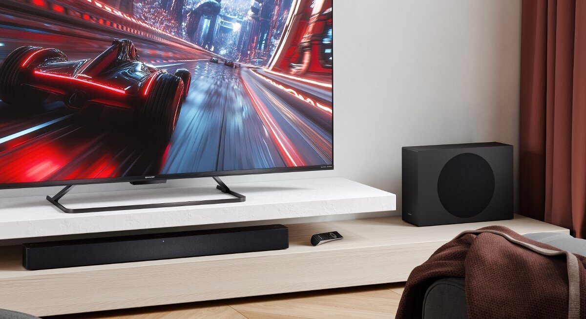 Soundbar SHARP HT-SBW312 subwoofer bezprzewodowy, mocny bas, realistyczne brzmienie, soundbar z subwooferem stojący na szafce