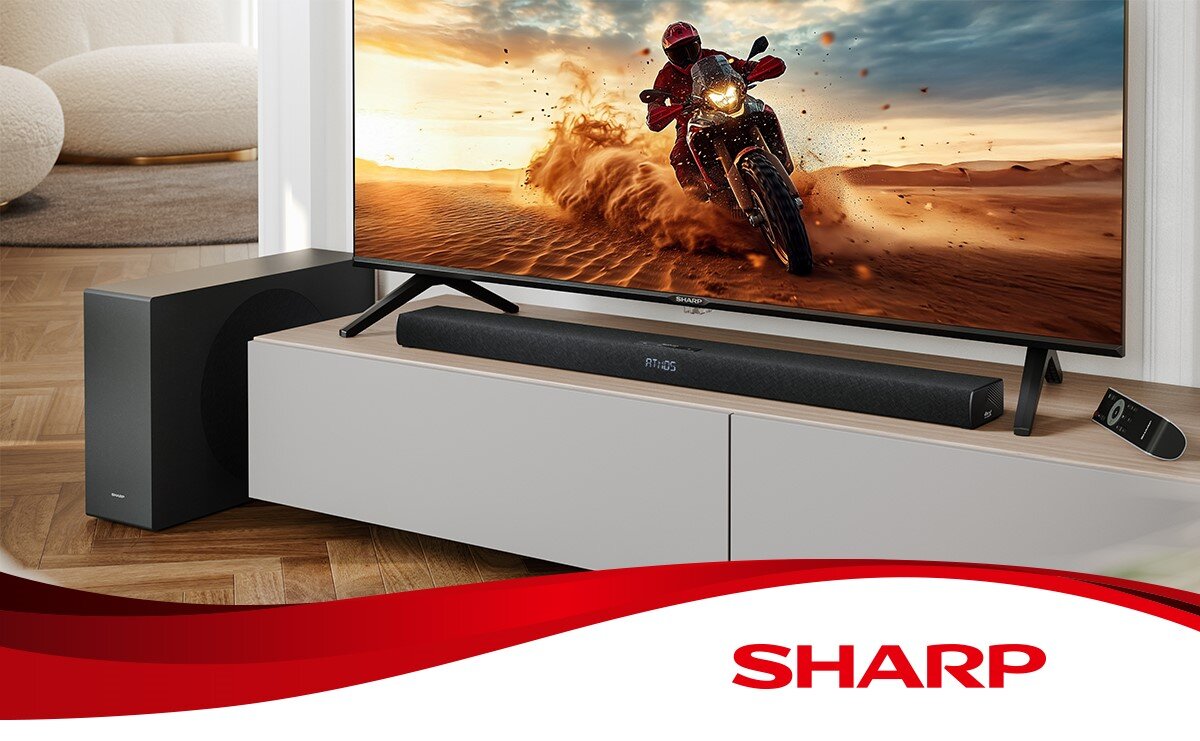 Soundbar SHARP HT-SBW320 dźwięk przestrzenny 3D, immersja, kino domowe, soundbar stojący na szafce pod telewizorem w pomieszczeniu