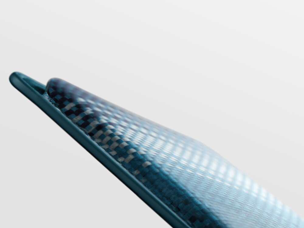 Portfel magnetyczny PITAKA Woven Wallet MagSafe
                portfel bez włożonych kart na jednolitym tle
                magnesy N52 magsafe warstwa ochronna demagnetyzacja płatności zbliżeniowe szybki dostęp jedna ręka