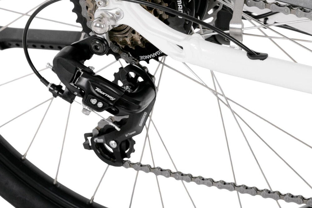 Rower elektryczny PROECO Wave AN 1.0 M19 28 cali Biały zbliżenie na przerzutkę manetki SHIMANO Revoshift typu RS35 7 biegów tylna przerzutka SHIMANO Tourney duża wytrzymałość sprawne działanie zmiana biegów jest płynna i bezproblemowa