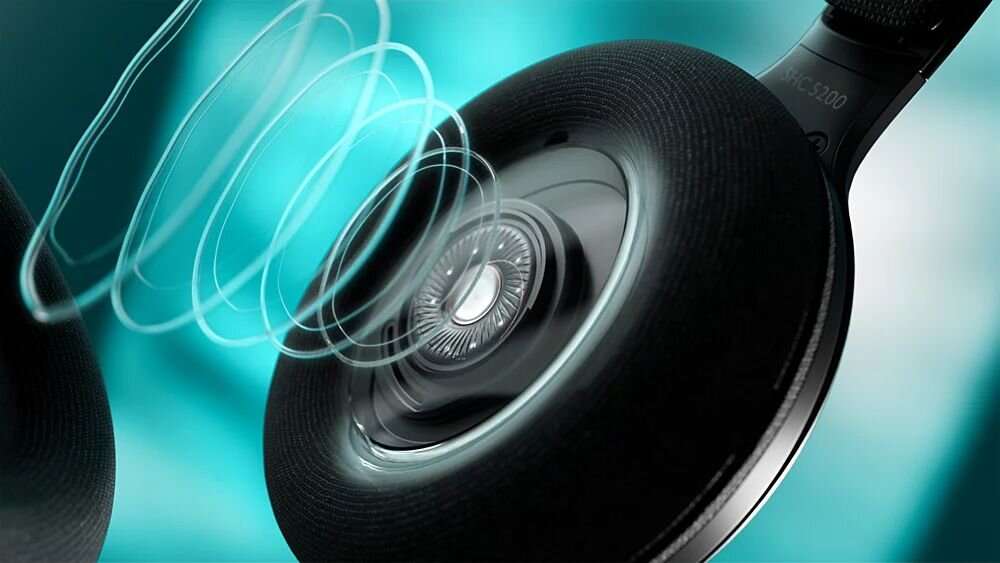 Słuchawki nauszne PHILIPS SHC5200M2/12, przetworniki 32 mm, dwuwarstwowy pałąk, lekkie miękkie nauszniki, słuchawki na turkusowym tle