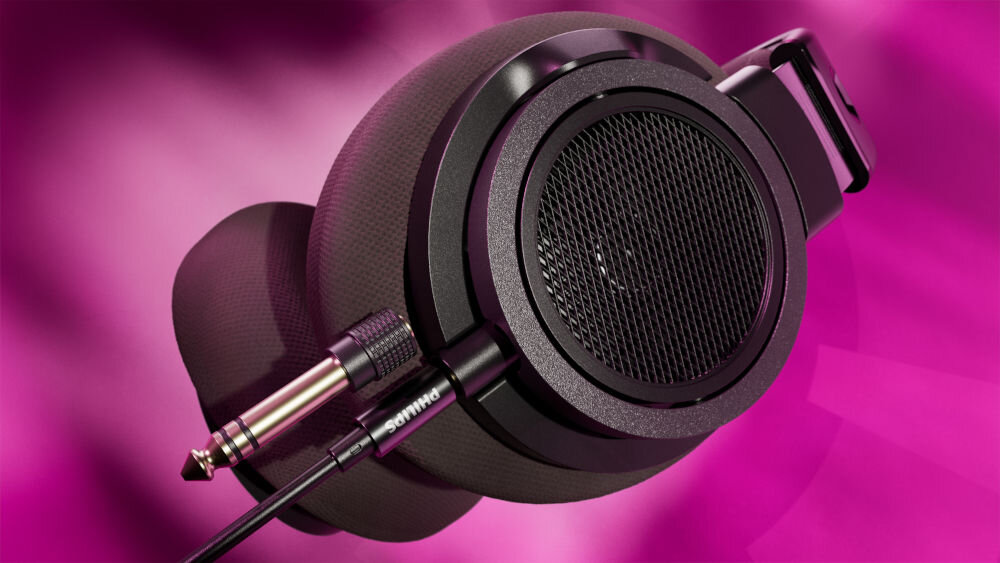 Słuchawki nauszne PHILIPS SHP9500CY/00 kabel 3 m adapter 6,3 mm audio, słuchawki nauszne po skosie na różowym tle, adapter
