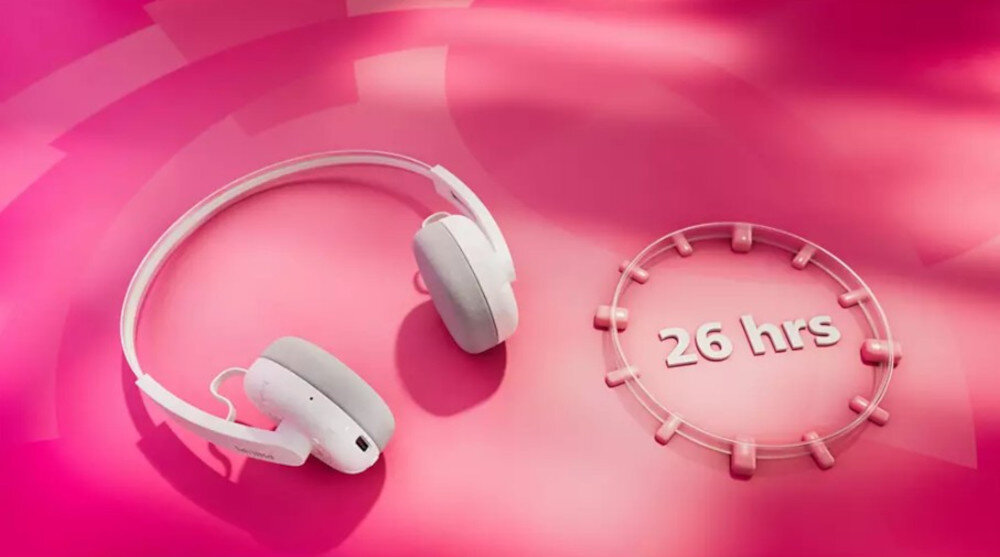 Słuchawki PHILIPS TAH2000WT/00 USB-C szybkie ładowanie i długa praca baterii, słuchawki leżące na różowym podłożu
