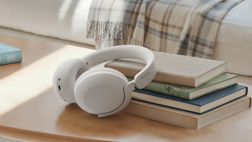 PHILIPS TAH8000EWT/00 słuchawki aplikacja Philips Headphones, Dynamic Bass, Spatial Audio, Auracast, słuchawki nauszne oparte o książki