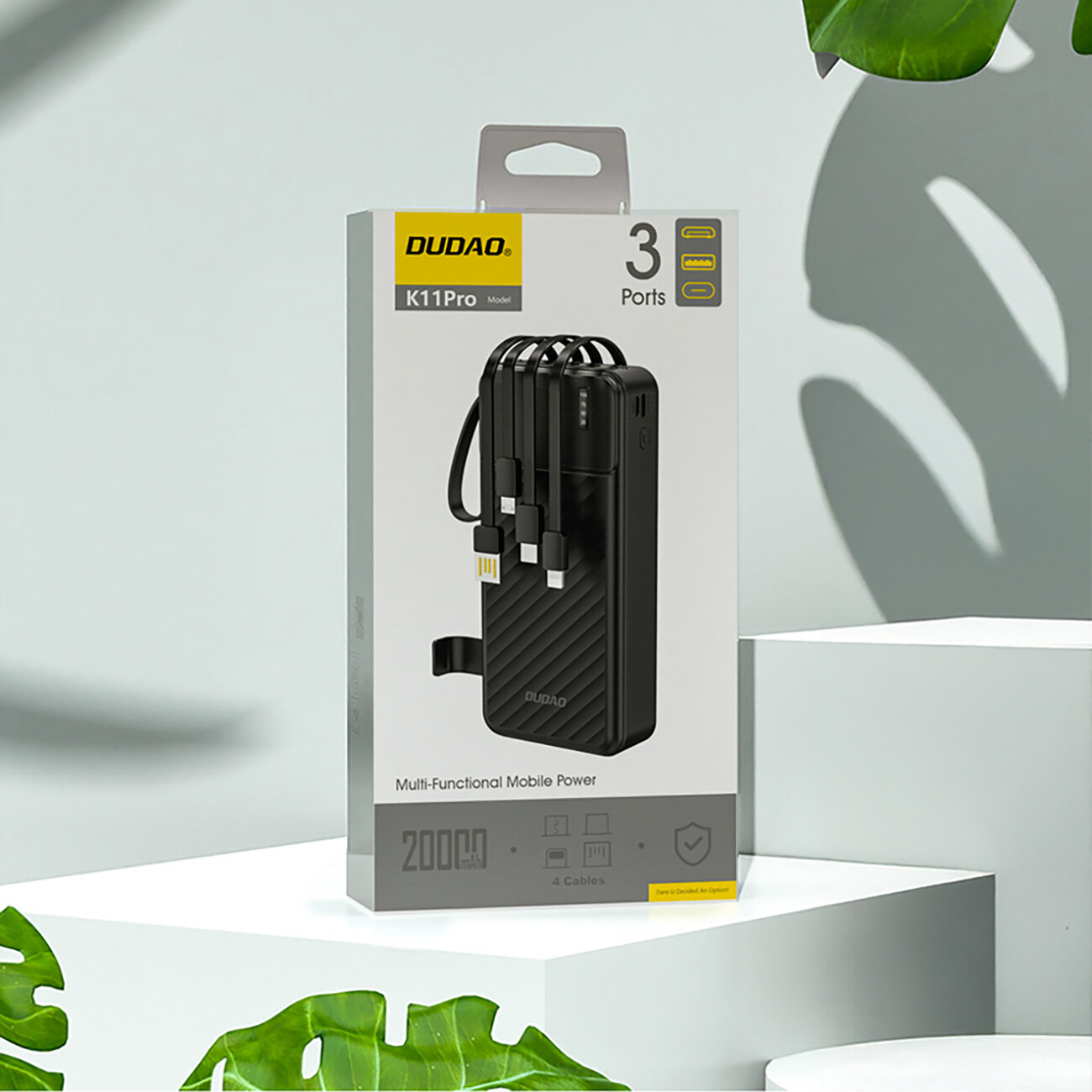 Opakowanie powerbanku Dudao K11 Pro z wbudowanymi kablami, o pojemności 20000mAh, z trzema portami. Na opakowaniu widoczne są napisy: \'Dudao\', \'K11Pro Model\', \'3 Ports\', \'Multi-Functional Mobile Power\', \'20000mAh\', \'4 Cables\'.