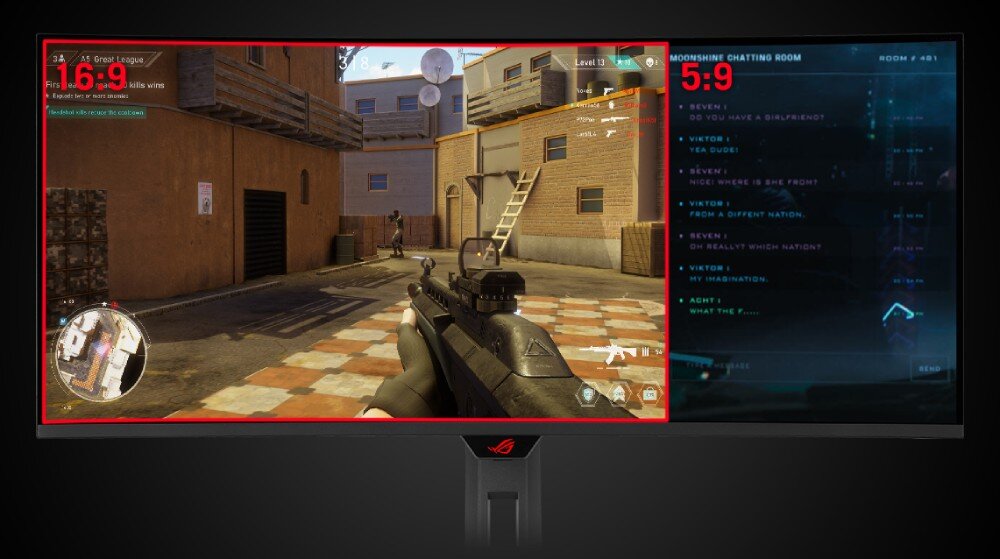 Monitor wyświetla grę FPS z widokiem z perspektywy pierwszej osoby oraz czat z wynikami po prawej stronie. Logo producenta znajduje się na dolnej ramce monitora.