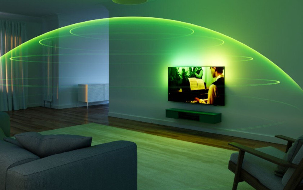 Telewizor PHILIPS 75MLED950 Dolby Atmos DTS:X dźwięk przestrzenny, telewizor zawieszony na ścianie otoczony dźwiękiem