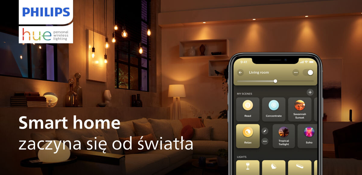 Inteligentna żarówka LED PHILIPS HUE 929003856101 9.5W E27 Bluetooth, ZigBee , oświetlenie, ciepło, komfrot, wygoda, w tle pokój wieczorową porą, na pierwszym planie smartfon z aplikacją HUE i napisem smart home zaczyna się od światła