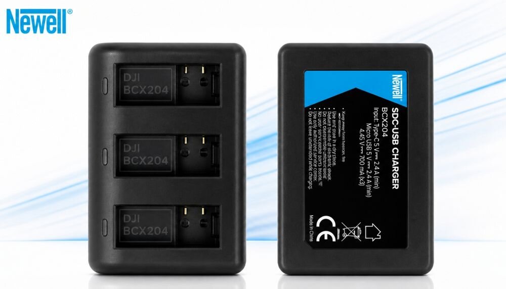 Na obrazie widoczna jest czarna ładowarka z trzema gniazdami oznaczonymi jako DJI BCX204 oraz etykieta z napisem \'Newell SDC-USB CHARGER\'.