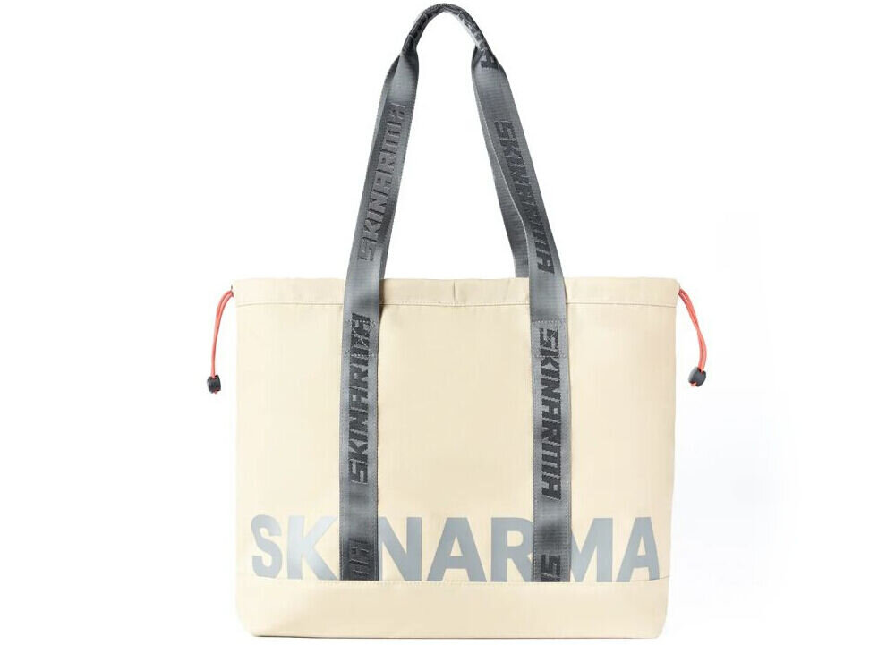 Torba SKINARMA Fardel Kość słoniowa prezentacja torby na białym tle wodoodporna konstrukcja i solidne wykończenie ochrona amortyzacja usztywnione dno stabilność