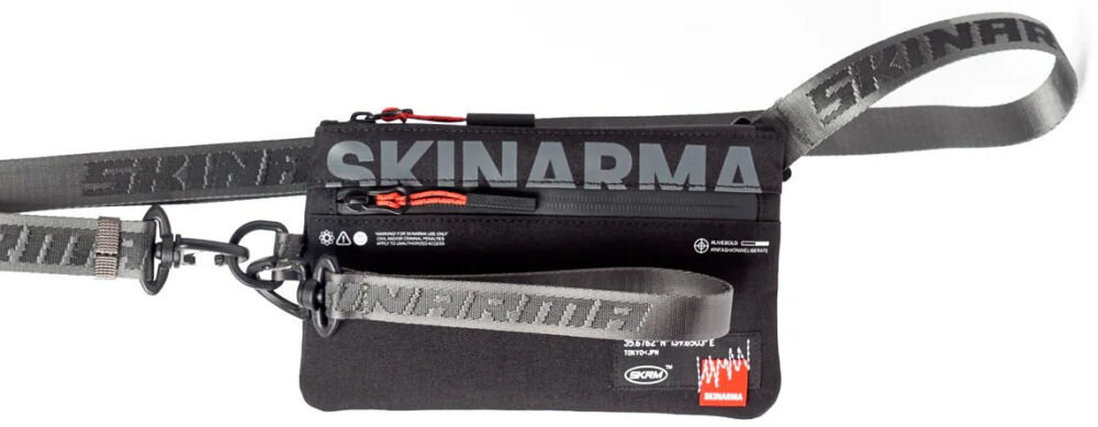 Torebka na telefon SKINARMA Fardel Czarny prezentacja torebki na białym tle połączenie stylu i technologii singapurska marka