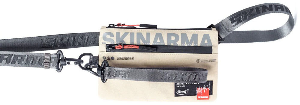 Torebka na telefon SKINARMA Fardel Kość słoniowa prezentacja torebki na białym tle torebka z odpinanymi paskami komfort