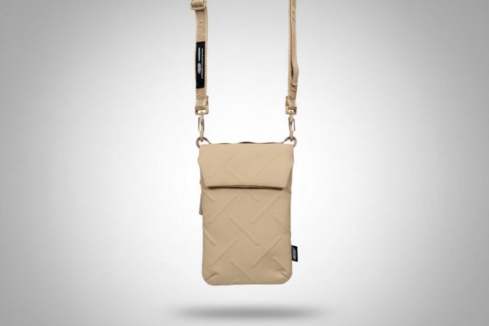 Torebka na telefon SKINARMA Juno Khaki prezentacja torebki na szarym tle