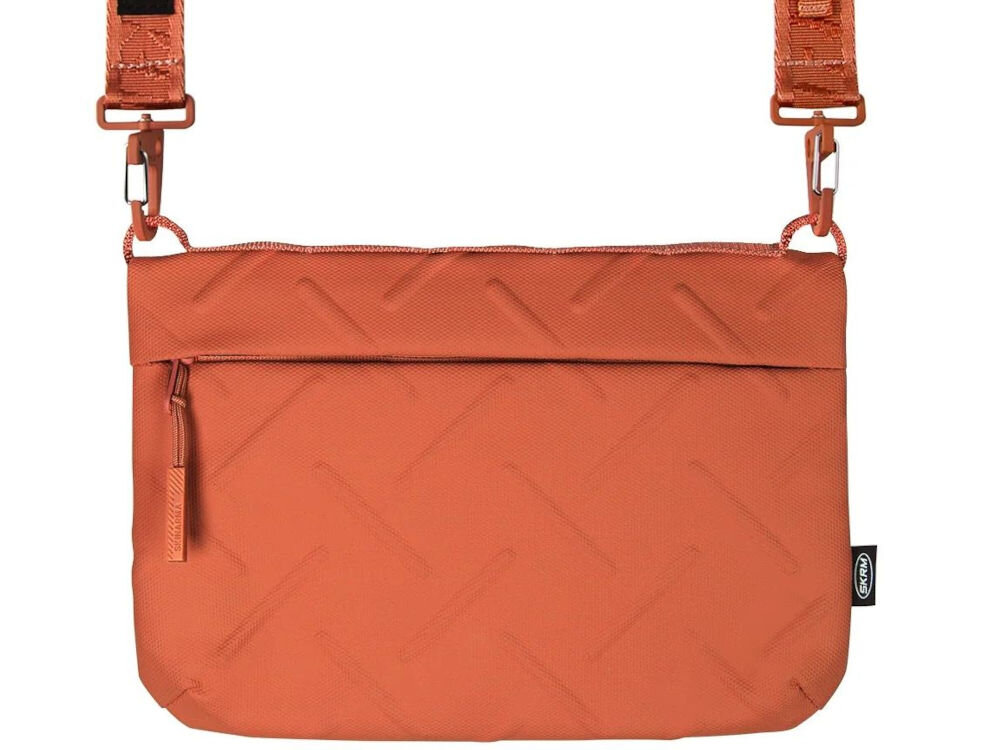 Torebka Crossbody SKINARMA Juno Pomarańczowy prezentacja torebki na białym tle składana torba z magnetycznym zapięciem praktyczność