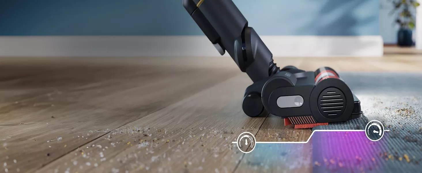 Mocny odkurzacz bezprzewodowy Philips automatycznie dostosowuje tryb pracy wjeżdżając z twardej podłogi na dywan.