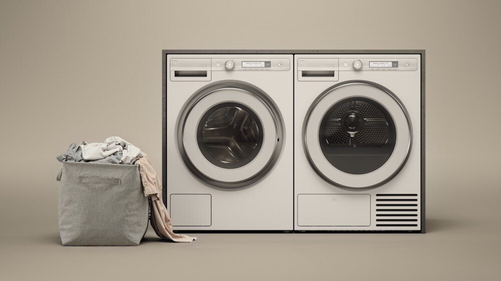 SUSZARKA ASKO T309HCW wizualizacja lifestyle dwa urządzenia obok siebie kolor biały pokrętło wyświetlacz panel sterowania zamknięte drzwiczki kosz na bieliznę pranie odzież obok