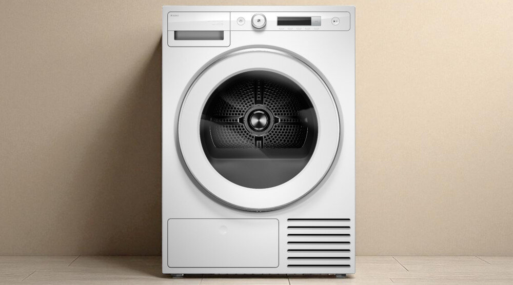 SUSZARKA ASKO T309HCW wizualizacja lifestyle dwa urządzenia obok siebie panel sterowania wyświetlacz pokrętło drzwiczki zamknięte szwedzka produkcja 20 lat trwałość 11 kg 18 programów duże wsady filtr One Motion Lint Filter Butterfly Drying skuteczne delikatne równomierne