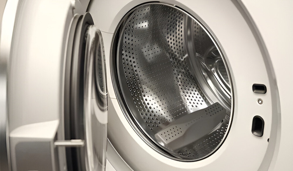 PRALKA ASKO W5114CXLW wizualizacja otwarte drzwiczki bęben wnętrze Steel Seal brak gumowego kołnierza 95% mniej bakterii trwałość pralki łatwy załadunek łatwy rozładunek higiena prania