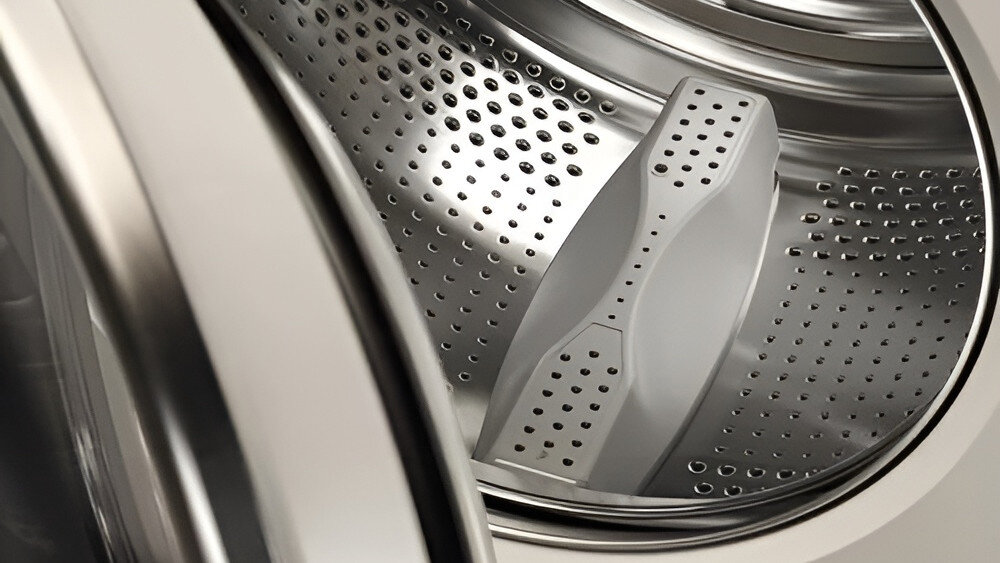 PRALKA ASKO W5114CXLW wizualizacja bęben Active Drum wnętrze konstrukcja budowa ochrona tkanin zabieraki klepsydra skuteczność prania delikatność materiałów usuwanie zabrudzeń piasek żwir higiena prania