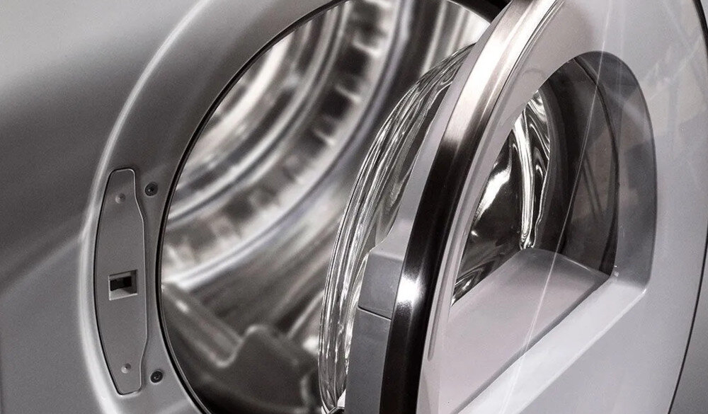 SUSZARKA ASKO T509HRT wizualizacja lifestyle otwarte drzwiczki bęben konstrukcja budowa bęben stal nierdzewna trwały odporny nie rdzewieje nie pęka eleganckie wykończenie