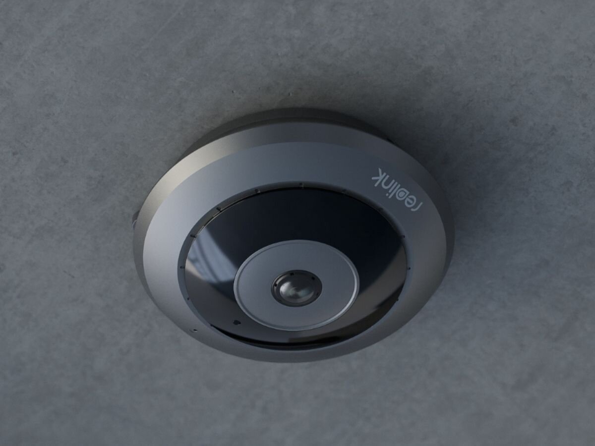 Kamera REOLINK Fisheye Series P520 Wewnętrzna, monitoring, obserwacja, bezpieczeństwo, ochrona, LAN / P2P, Kamera sufitowa marki Reolink zamontowana na betonowym suficie, okrągła, w kolorze srebrnym.