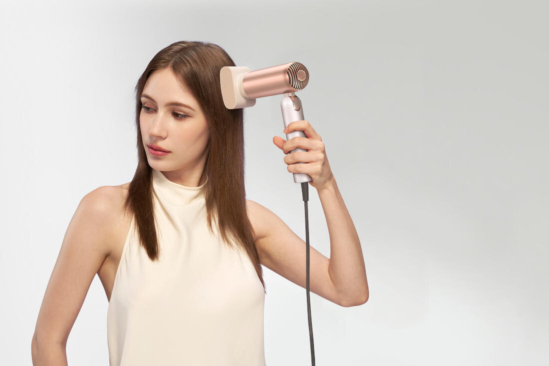 Suszarka DREAME Pocket Ultra Różowy 1500 W Gładkość dzięki jonom Technologia jonów ujemnych neutralizuje elektryzowanie wygładza pasma