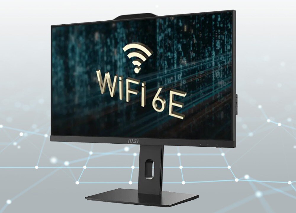 Komputer All in One MSI Pro AP242P 14M-649XEU Monitor komputerowy z logo MSI na dolnej ramce, wyświetlający napis \'WiFi 6E\' na tle cyfrowej grafiki. W tle widoczna jest abstrakcyjna sieć z połączonymi punktami, łączność Wi-Fi, pasma