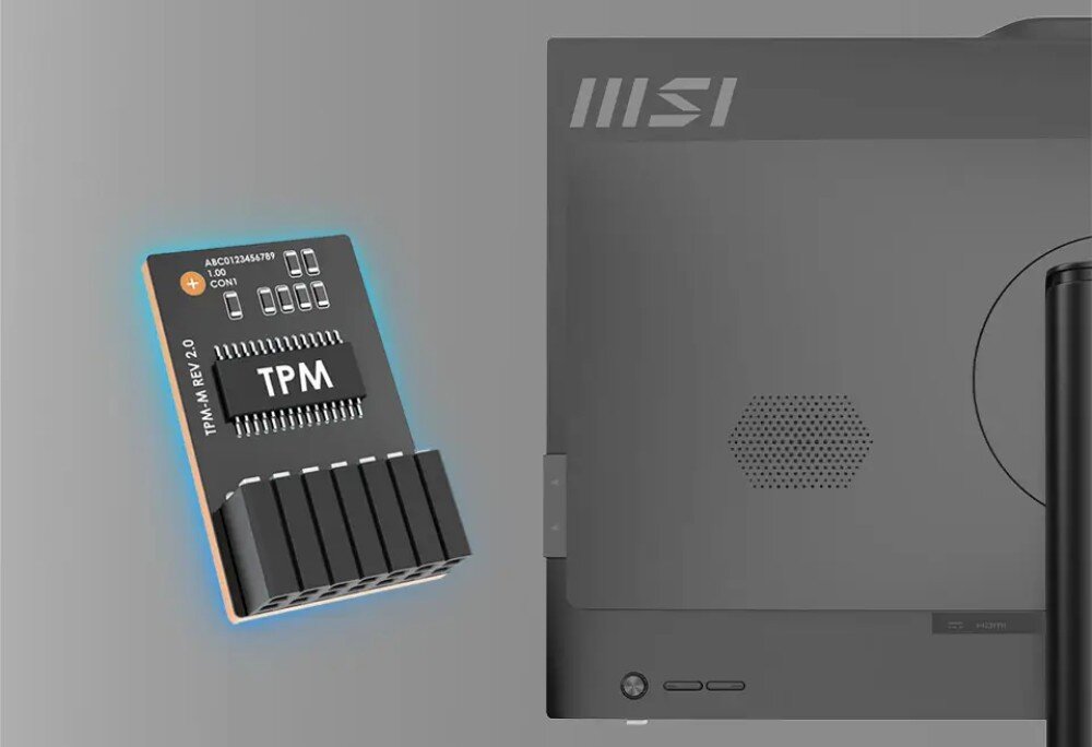 Komputer All in One MSI Pro AP242P 14M-649XEU Obraz prezentuje tył ciemnego monitora z logo MSI oraz powiększoną grafikę modułu TPM 2.0 po lewej stronie. Układ scalony unosi się w powietrzu i jest otoczony delikatną, niebieską poświatą, bezpieczeństwo, moduł TPM, zamek Kensington