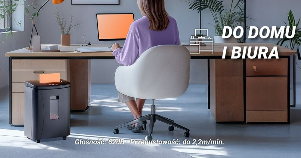 Niszczarka HAMA Safe Auto M1200 Shredder 25L, P-4, Ścinki kobieta siedząca przy biurku w jasnym pomieszczeniu obok biurka niszczarka z włożoną kartką głośność automatyczny podajnik na 120 arkuszy A4 cicha praca otwarte biuro praktyczna niszczarka