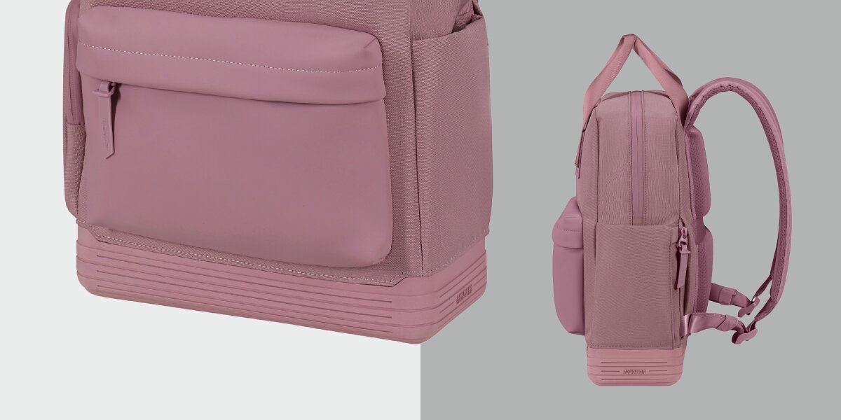 Plecak na laptopa AMERICAN TOURISTER Soulpack Business BP Tote 15 cali Różowy Zbliżenie na wzmocniony dół różowego plecaka oraz widok z boku prezentujący smukłą sylwetkę i boczną kieszeń.