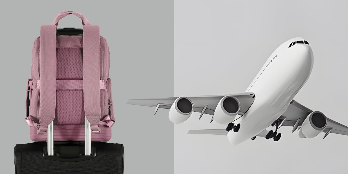 Plecak na laptopa AMERICAN TOURISTER Soulpack Business BP Tote 15 cali Różowy Różowy plecak American Tourister zamocowany na uchwycie walizki lotniczej na tle grafiki z samolotem – idealny do podróży.