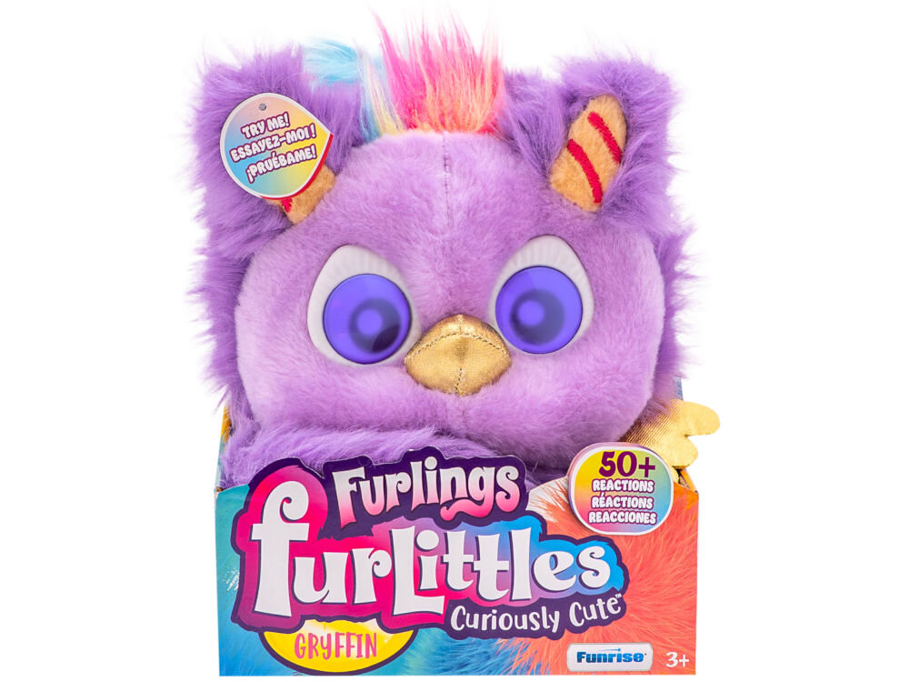 Zabawka interaktywna FURLINGS Furlittles Curiously Cute Gryffin 26117 Opakowanie zabawki interaktywnej Furlings Furlittles Gryffin (Curiously Cute). Pluszowa, fioletowa maskotka z kolorowym irokezem, dużymi oczami oraz informacją 50+ reactions (ponad 50 reakcji).