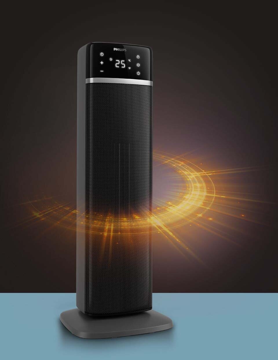 Czarny termowentylator z wyświetlaczem pokazującym temperaturę 25 stopni, na którym widnieje logo PHILIPS. W tle widoczny jest efekt świetlny w postaci pomarańczowego kręgu.