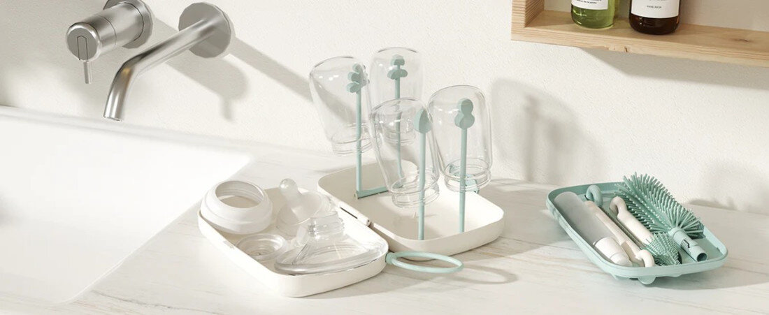 Zestaw szczotek do czyszczenia butelek MOMCOZY 7w1 Zielony Składana suszarka i przechowywanie jednocześnie wiele butelek i części laktatora łatwo się składa pojemnik do przechowywania