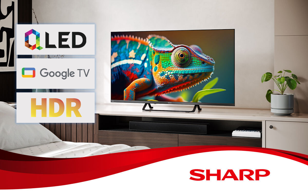 Telewizor SHARP 40HF3865E QLED Google TV, telewizor stojący na komodzie w pomieszczeniu