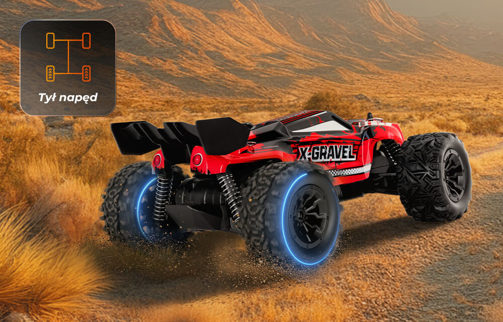 Samochód zdalnie sterowany OVERMAX X-Gravel Widok samochodu X-GRAVEL od tyłu, jadącego po pustynnym terenie. Wyraźnie widoczne są duże, agresywne opony i amortyzatory. Ikona w rogu informuje o tylnym napędzie (Tyl napęd).