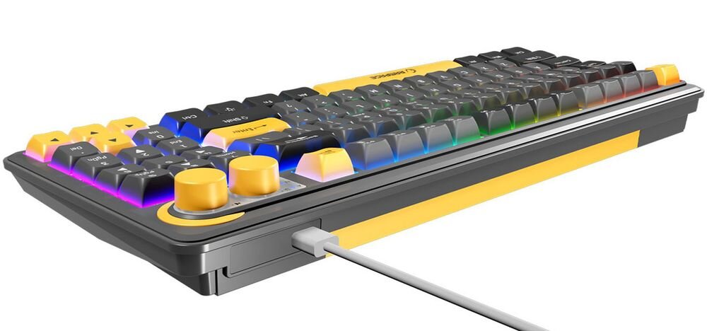 Klawiatura mechaniczna z kolorowym podświetleniem RGB i żółtymi akcentami, posiada dwa żółte pokrętła oraz podłączony biały kabel USB.